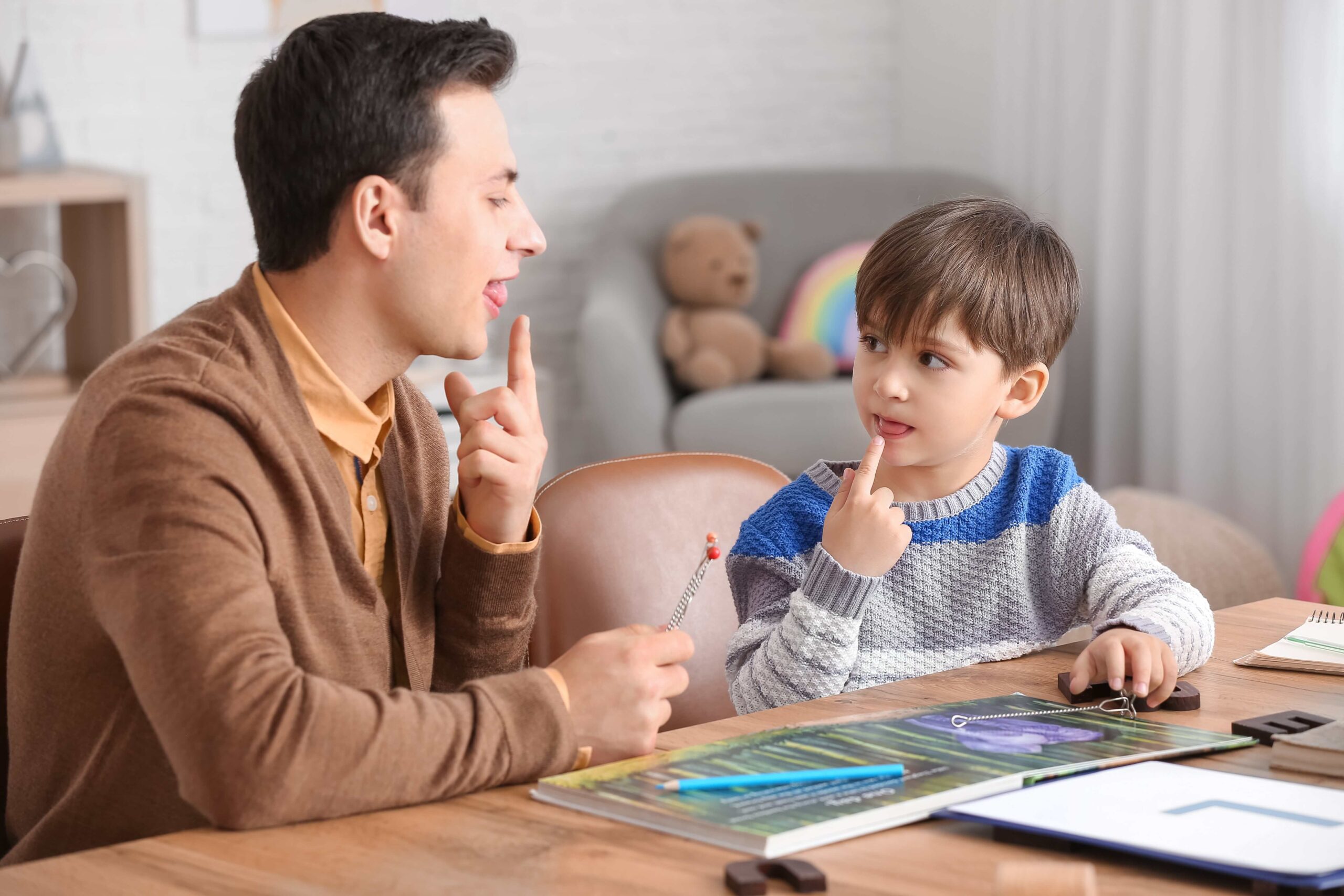 a kid having a conversation with an instructor